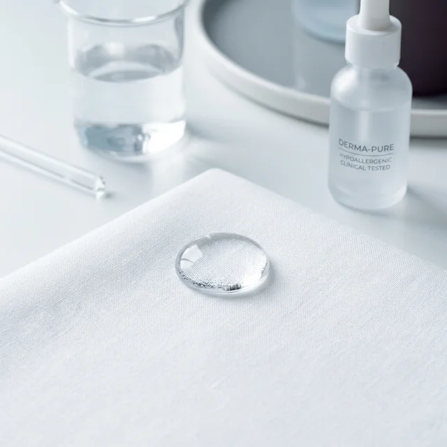 Pure water droplet on organic fabric